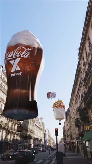 Burger Hot Air Balloons Fly Over City in a fake-out-of-home ad of McDonald's