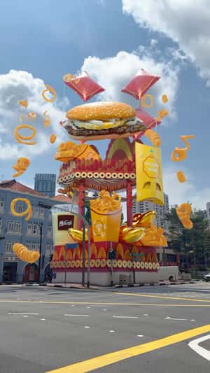 Flying Burger with Curly Fries in a fake-out-of-home ad of McDonald's