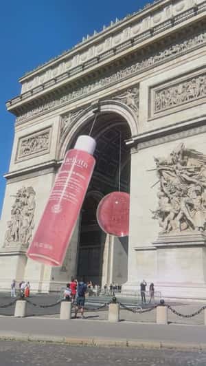 Essence Bottle Swings at Monument in a fake-out-of-home ad of Melvita