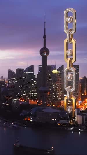 Golden Chain Bracelet Skyscraper in a fake-out-of-home ad of Messika