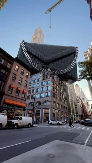 Crane Places Bag in a fake-out-of-home ad of Michael Kors Crane