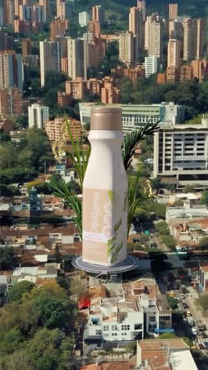 Pink Cloth Uncovers Hair Conditioner in a fake-out-of-home ad of Milagros
