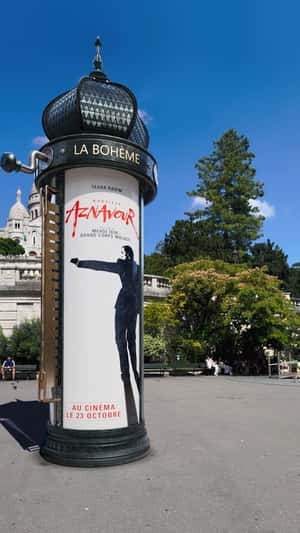 Rolling Poster on Morris Column in a fake-out-of-home ad of Pathé Films