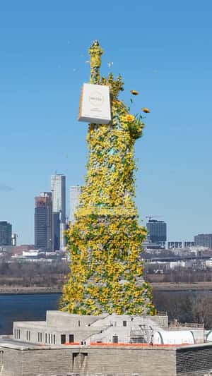 Statue of Liberty Wrapped in Flowers in a fake-out-of-home ad of Motek