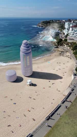 Face Mist Inflates on Beach in a fake-out-of-home ad of Naked Sundays