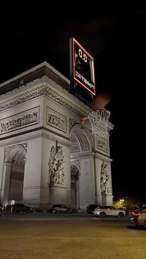 Basketball Shot at Ring on Monument in a fake-out-of-home ad of Tissot