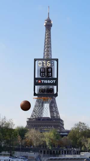 Basketball Hoop at Eiffel Tower in a fake-out-of-home ad of Tissot