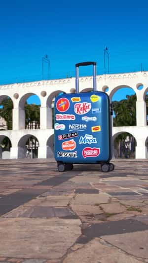 Suitcase Spills Products in a fake-out-of-home ad of Nestle