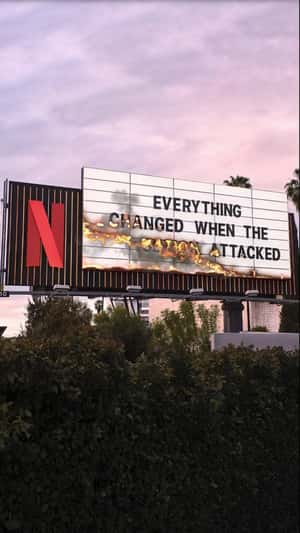 Billboard Fire Reveals Update in a fake-out-of-home ad of Netflix