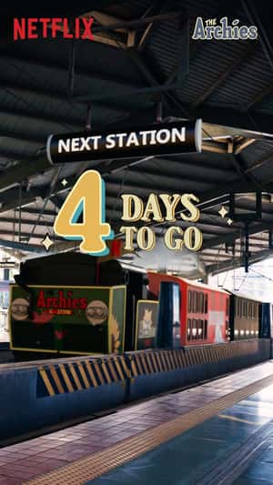 Show-Themed Train Pulls into Station in a fake-out-of-home ad of The Archies