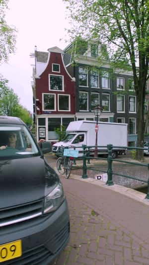 Car Runs Above Canal in a fake-out-out-of-home ad of Nissan