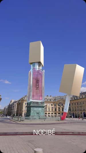 Lip Oil Monument in a fake-out-of-home ad of Nocibé