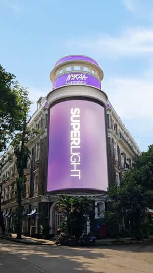 Superlight Foundation Bursts from corner building in a fake-out-of-home ad of Nykaa