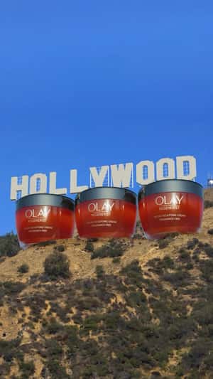Hollywood Lifted by Giant Cream Jars in a fake-out-of home ad of Olay