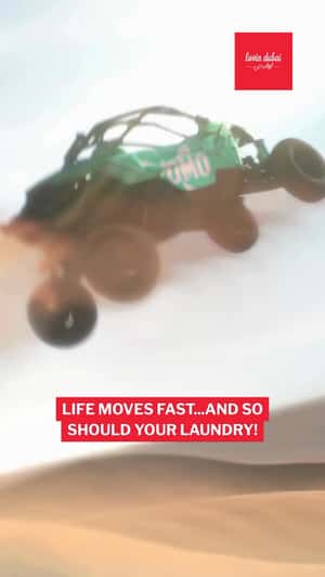 Dune Buggies Swirl to Reveal Giant Bottle in a fake-out-of-home ad of OMO