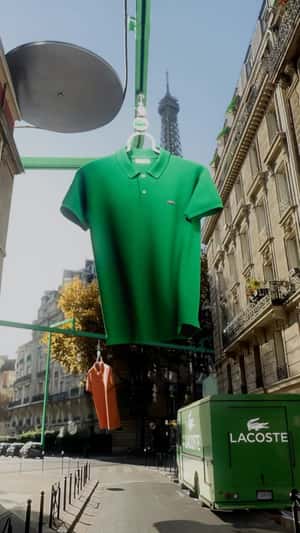 Polo Shirts in Moving Machine in fake-out-of-home ad of Lacoste