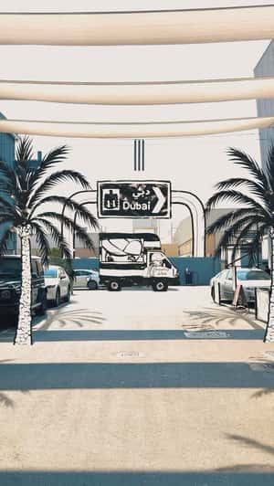 Paperboy Pop-Up Truck Travels from Paris to Dubai in a fake-out-of-home ad of Ounass