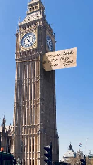 Massive Note on Big Ben in a fake-out-of-home ad of Paddington the Musical