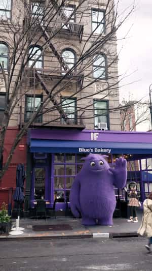 Purple Monster Visits Blue's Bakery in a fake-out-of-home ad of IF Movie