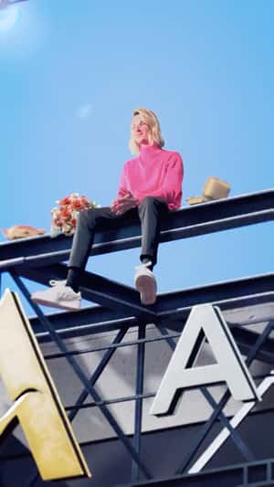 Paul Mirabel Sits Atop Accor Arena in a fake-out-of-home ad of Paul Mirabel