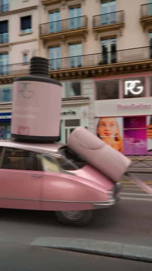 Giant Pink Nail Polish Colors Parisian Streets in a fake-out-of-home ad of Pink Gellac