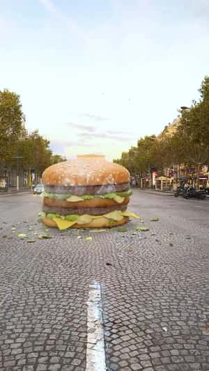 Helicopter Drops Giant Burger in a fake-out-of-home ad of Point B