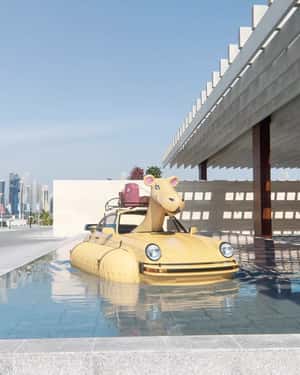 Porsche-Camel Hybrid Floats at The Ned in a fake-out-of-home ad of Porsche