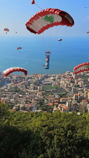 Bottles Parachute Over Beirut's Coastline in a fake-out-of-home ad of Pril