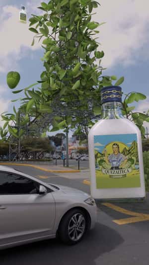 Giant Guanaba Bottle Drops from Tower in a fake-out-of-home ad of Quezalteca