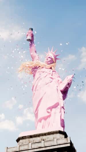 Hair Color Turns Statue of Liberty Pink in a fake-out-of-home ad of Redken
