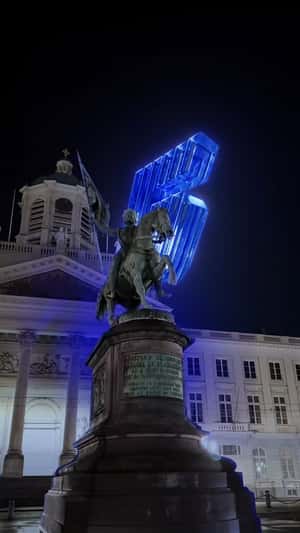Giant Blue Number 5 at Place Royale in a fake-out-of-home ad of Renault