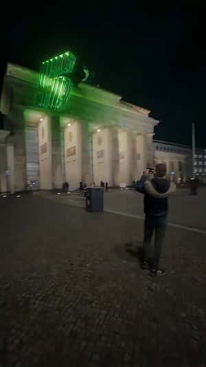 Giant Green Number 5 at Brandenburg Gate in a fake-out-of-home ad of Renault