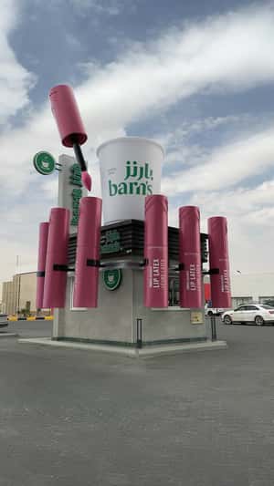 Giant Lipsticks Surround Barns Café in a fake-out-of-home ad of Rimmel