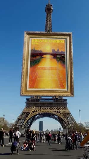 Giant Poster on Eiffel Tower in a fake out of home ad of Roland Garros