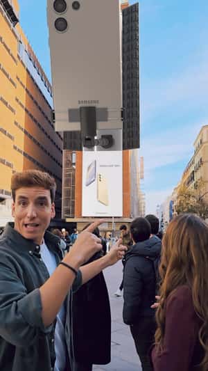 Phone Emerges from Building in a fake-out-of-home ad of Samsung