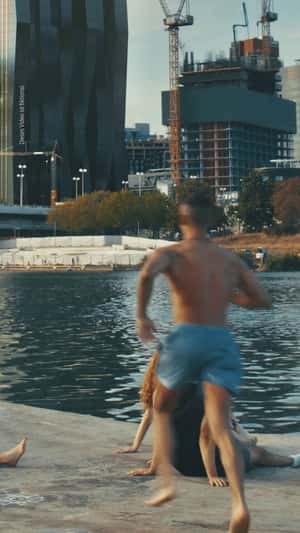 Skyscraper Facade Turns Into a Phone in a fake-out-of-home ad of Samsung