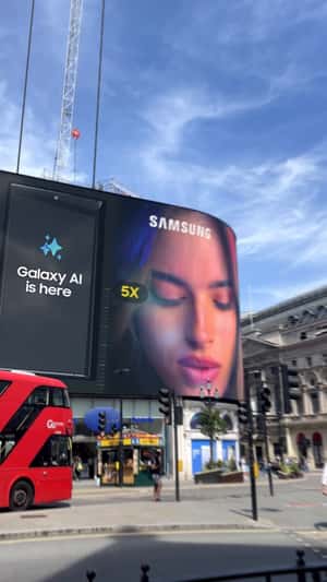 Phones Towers Over City Streets in a fake-out-of-home ad of Samsung