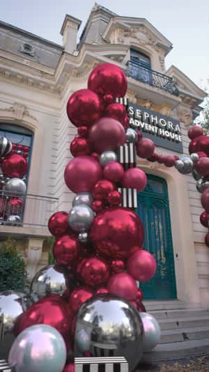 Holiday Ornaments at Advent House in a fake-out-of-home ad of Sephora