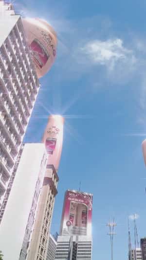 Giant Bottles Atop Buildings in São Paulo in a fake-out-of-home ad of Skala Cosméticos
