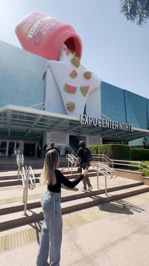 Bottle Pours Over Expo Center Norte in a fake-out-of-home ad of Skala Cosméticos