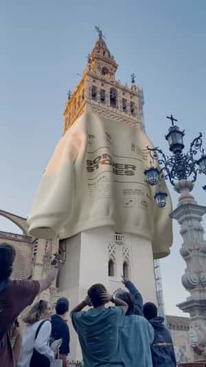 Hoodie Drapes Giralda Tower in a fake-out-of-home ad of Sonderstories