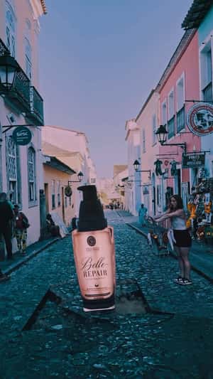 Huge Bottle Drops on Street in a fake-out-of-home ad of Soul Hair Professional