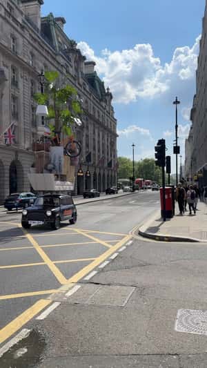 Mini Cooper Stacked High on London Streets in a fake-out-of-home ad of Stackt