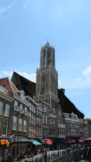 Giant Blazer Wraps Dom Tower in a fake-out-of-home ad of Studio Anneloes