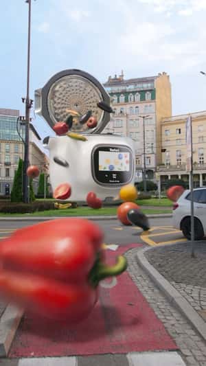 Massive Vegetables Rolling on Street in a fake-out-of-home ad of Tefal