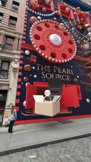 Holiday Installation Storefront in a fake-out-of-home ad of The Pearl Source