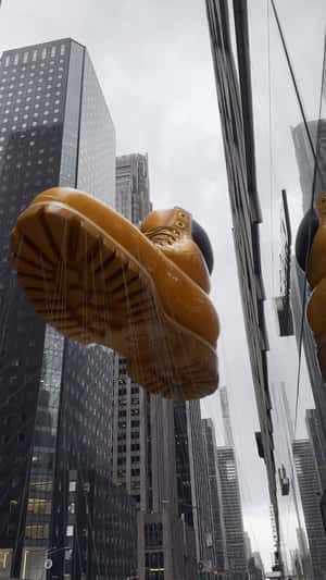 Giant Floating Yellow Boot in a fake-out-of-home ad of Timberland