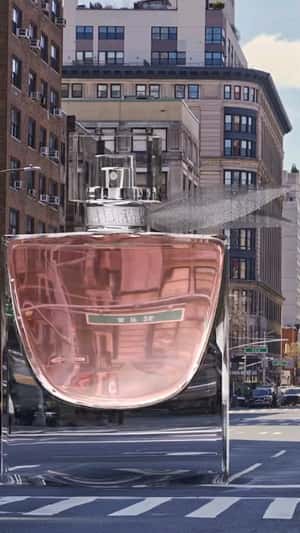 Oversized perfume in NYC fake out of home ad of Lancôme 