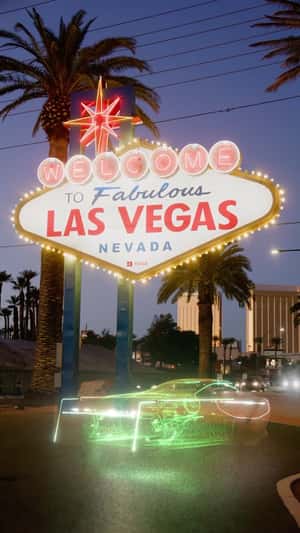 Holographic Cars Light Up Las Vegas in a fake-out-of-home ad of Valeo