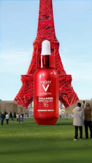 Serum Covers Eiffel Tower in Red Fibers in a fake-out-of-home ad of Vichy Laboratoires